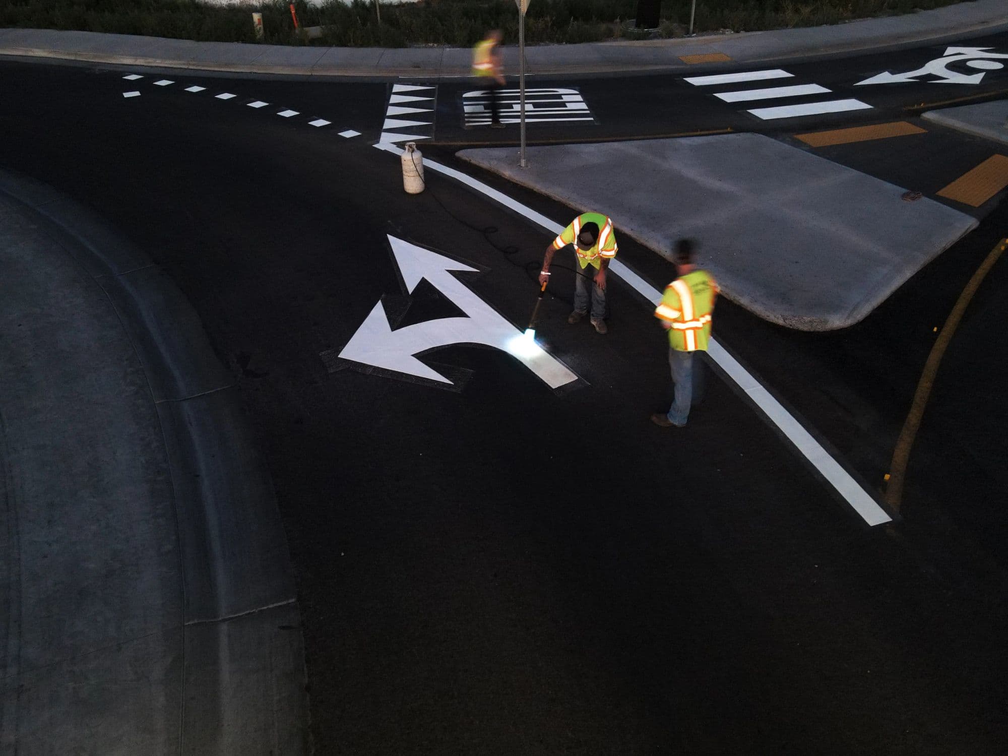Laying down road markings after dark