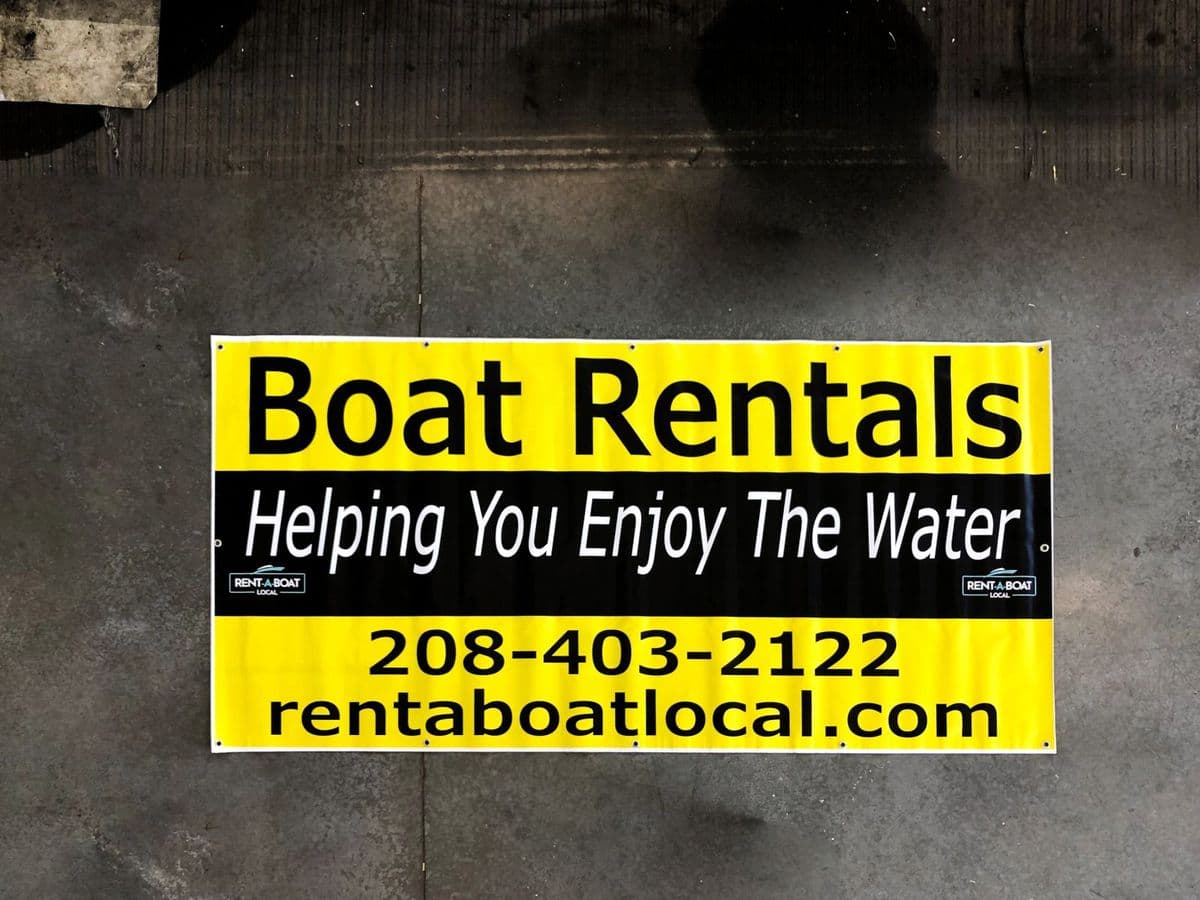 Boat Rentals advertising banner in yellow and black