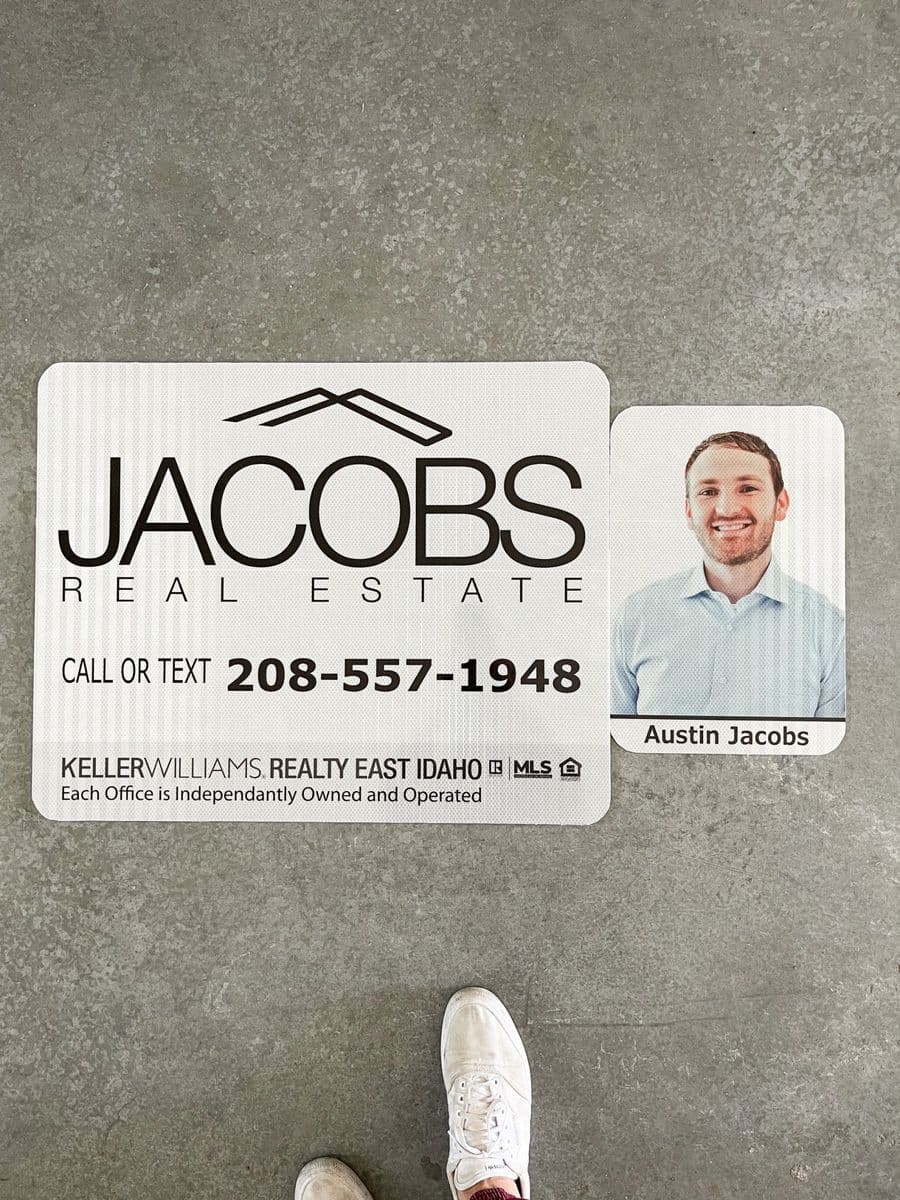 Jacobs Real Estate agent sign with headshot and contact details