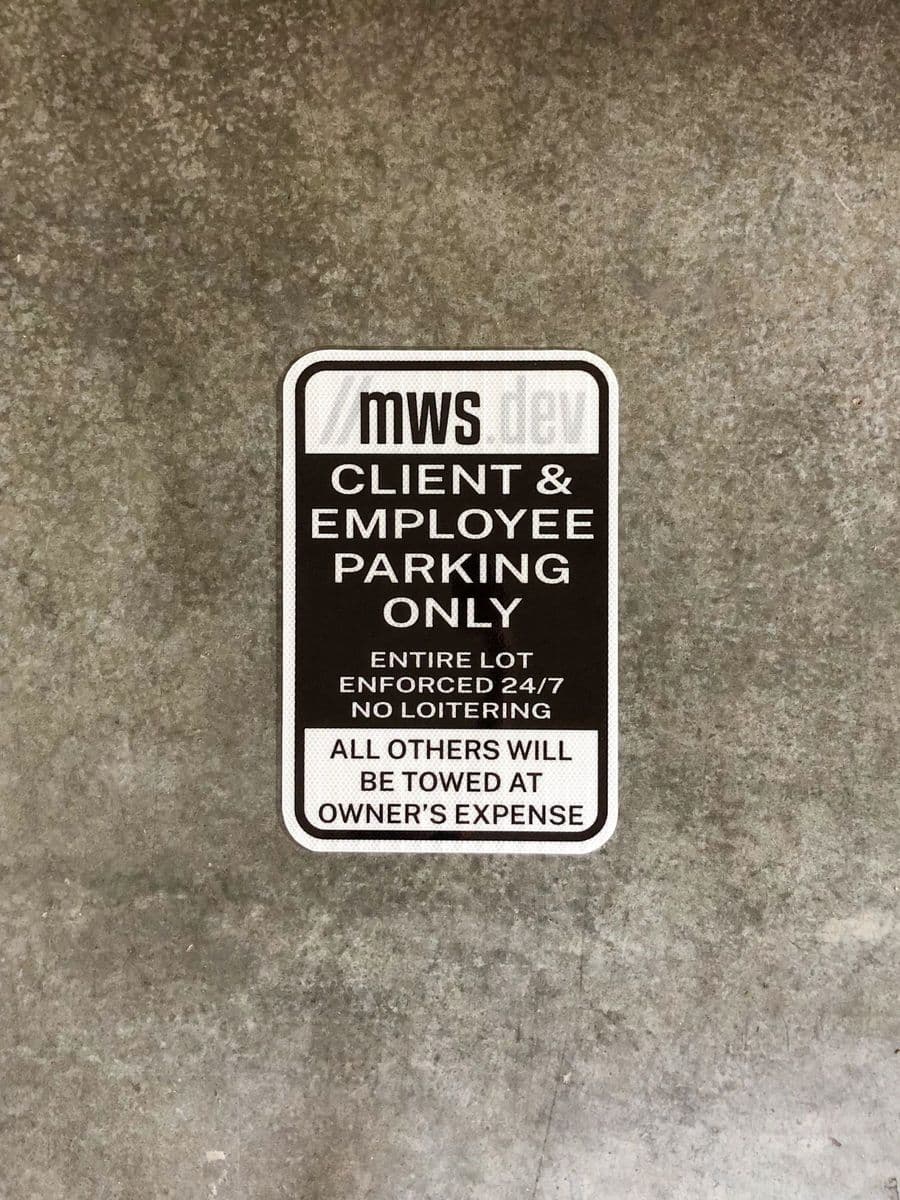 MWS branded client and employee parking enforcement sign