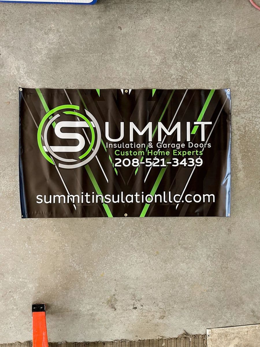 Summit Insulation & Garage Doors outdoor banner mounted on a wall